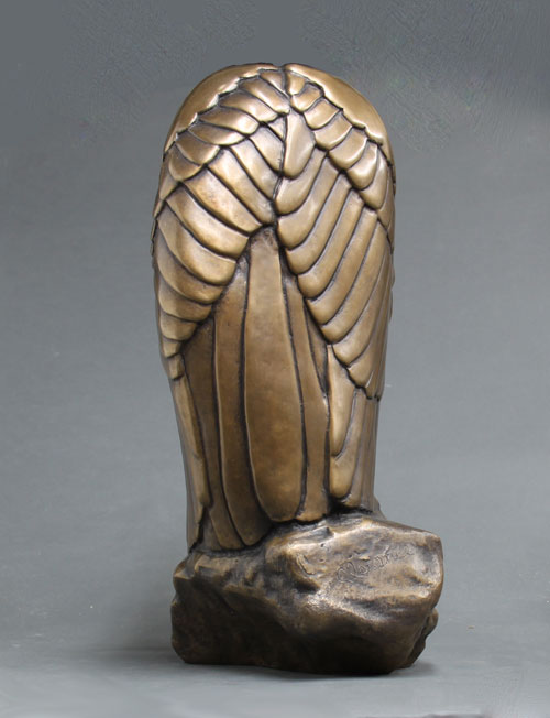 A view of the back of the bronze called, The Sentry